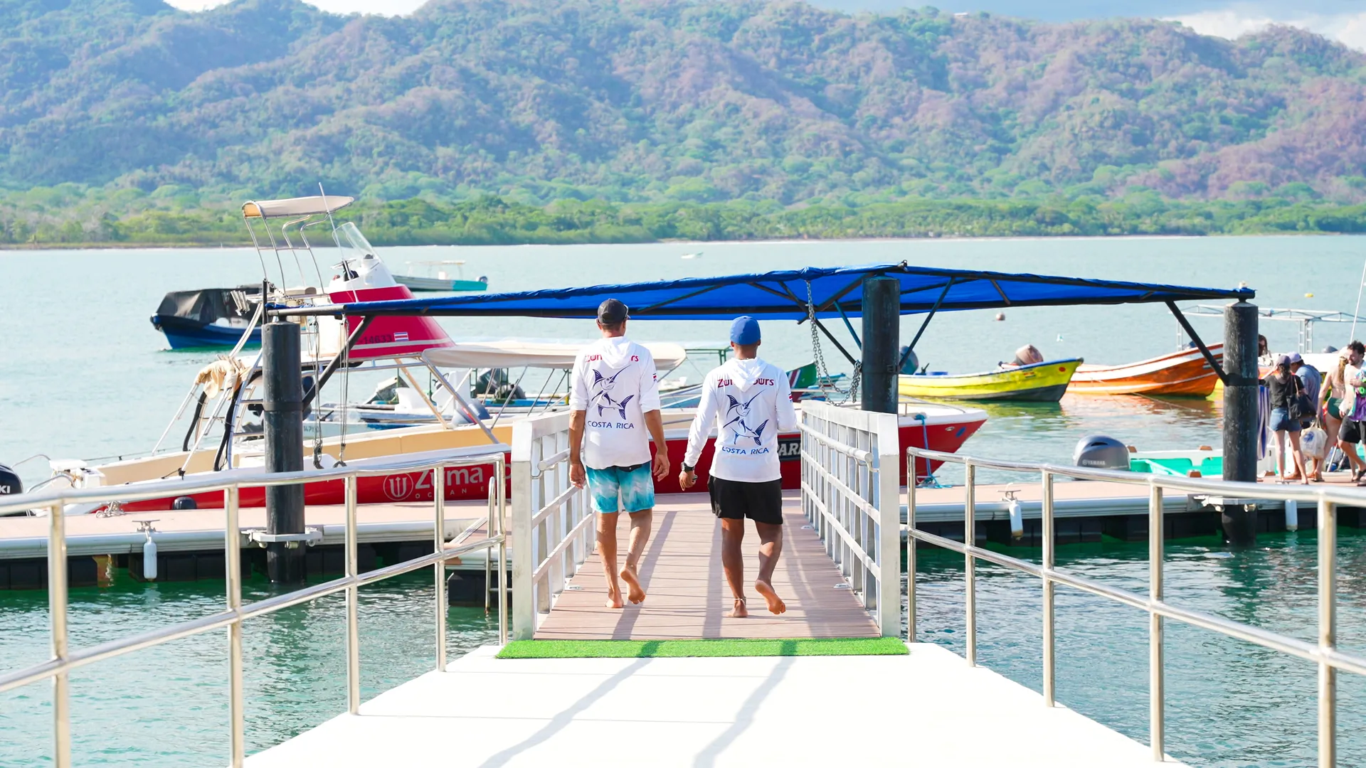 Walking the pier toward the marina in Costa Rica